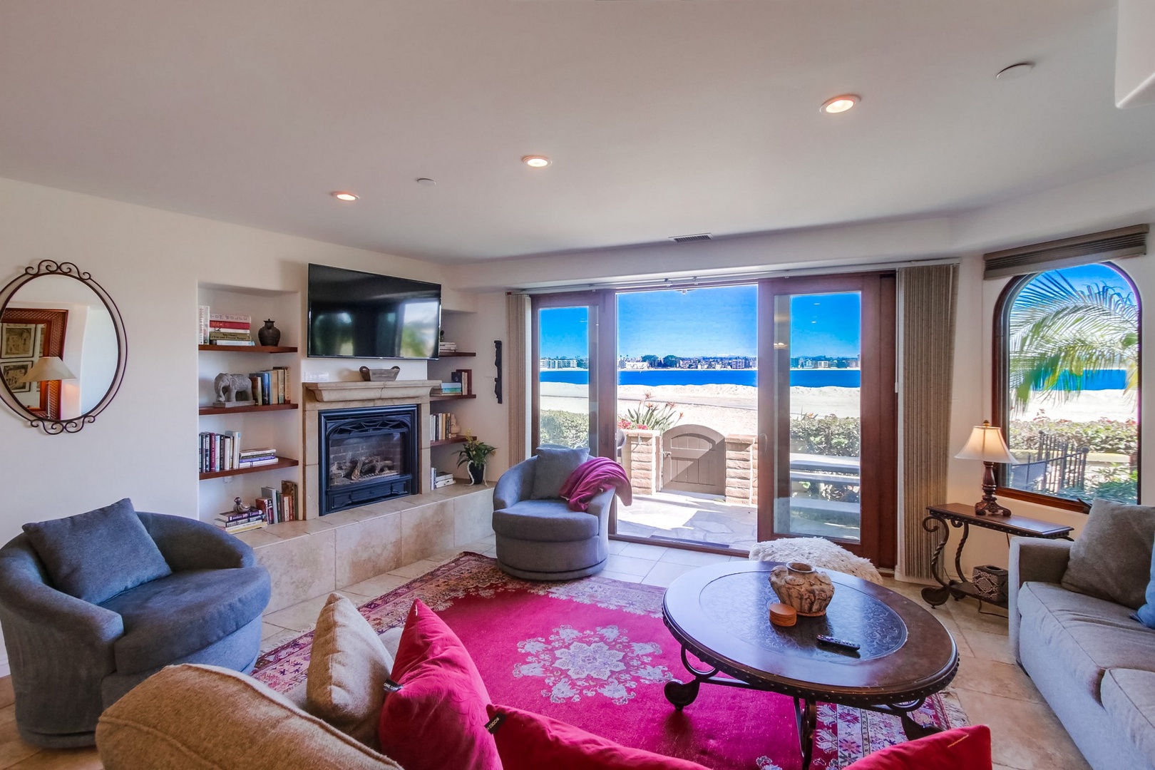 Living room with fireplace and TV