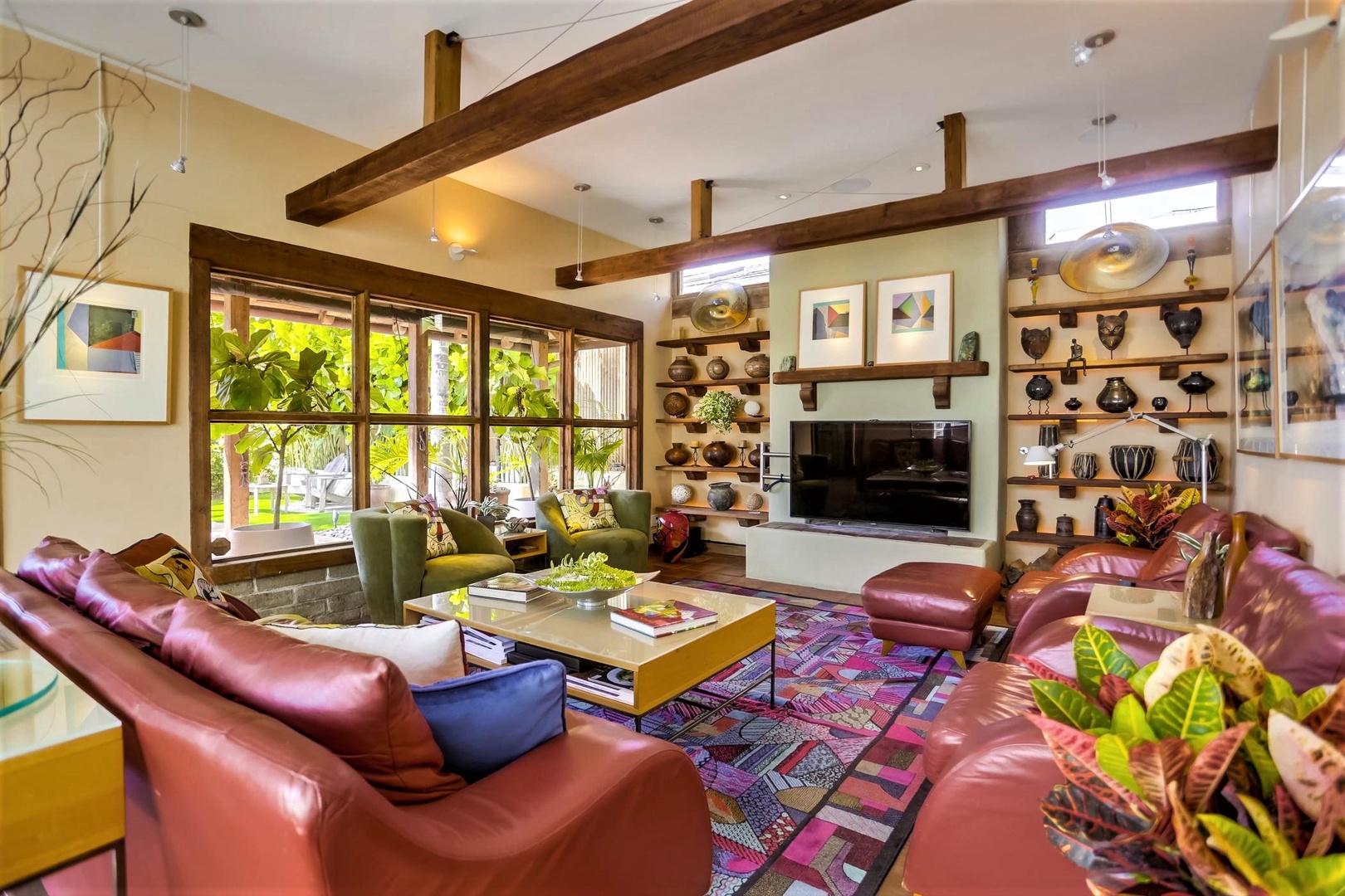 Living room features leather sofas