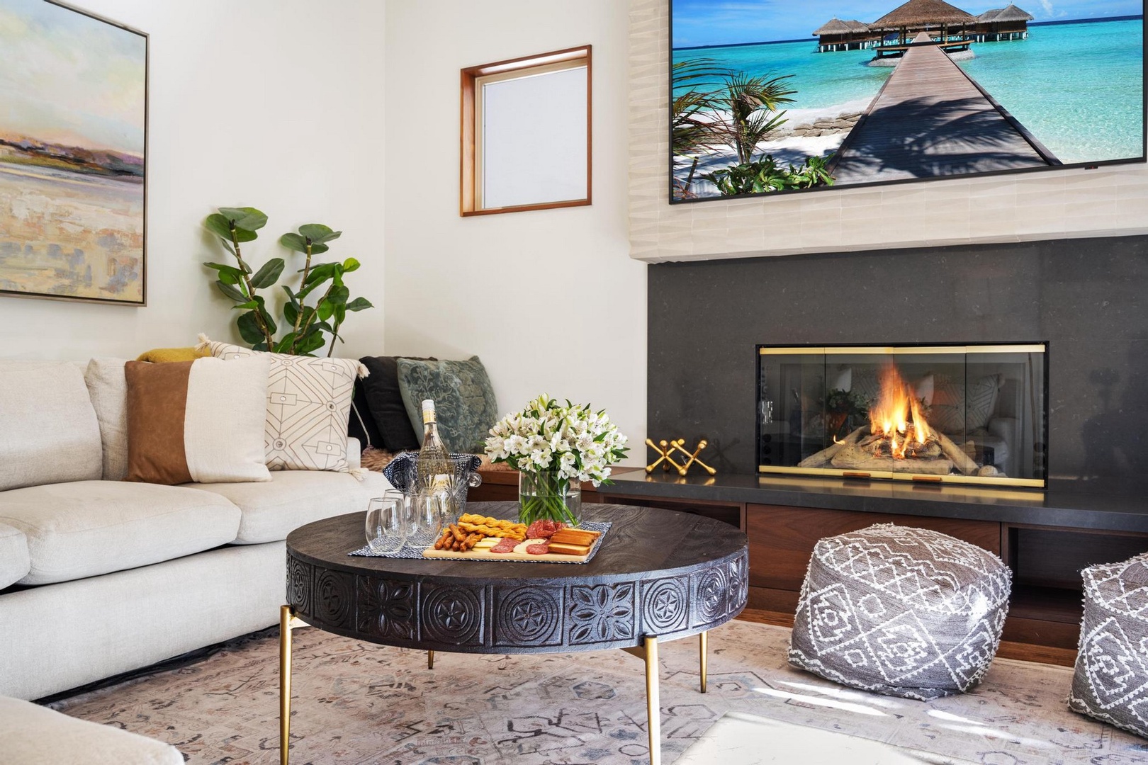 Living area with gas fireplace and TV