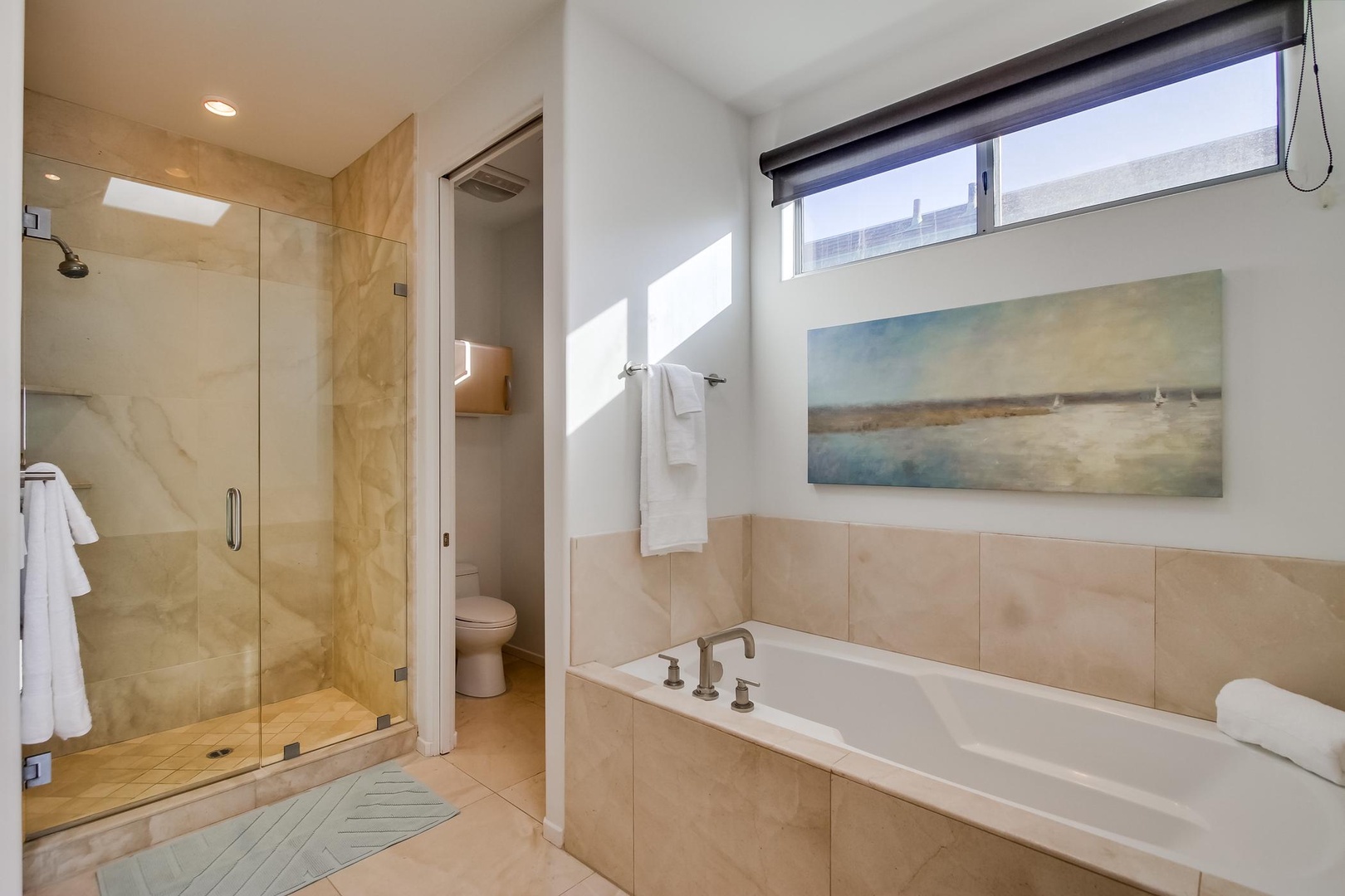 En-suite bathroom with bathtub