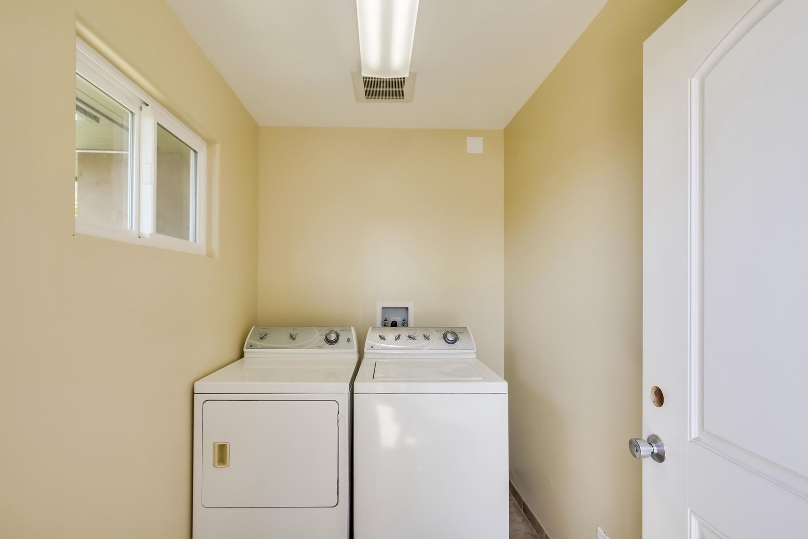 Laundry room with full washer/dryer