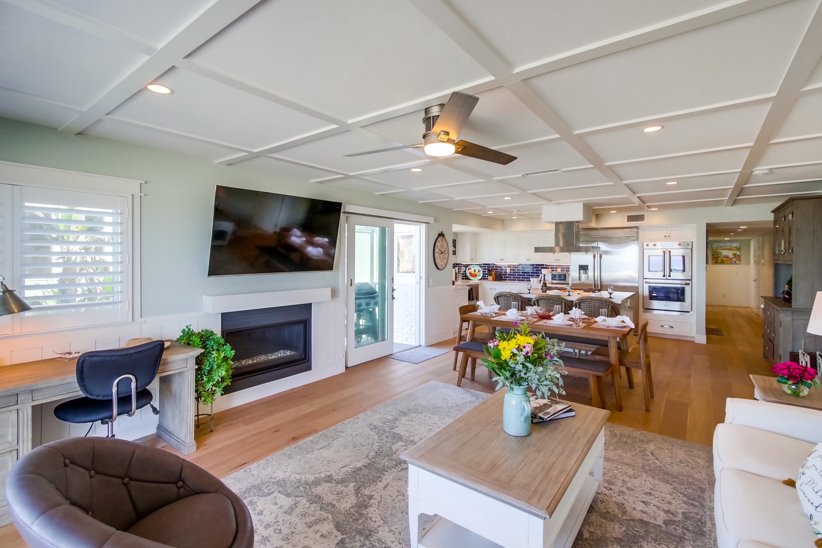 Living area with TV and fireplace