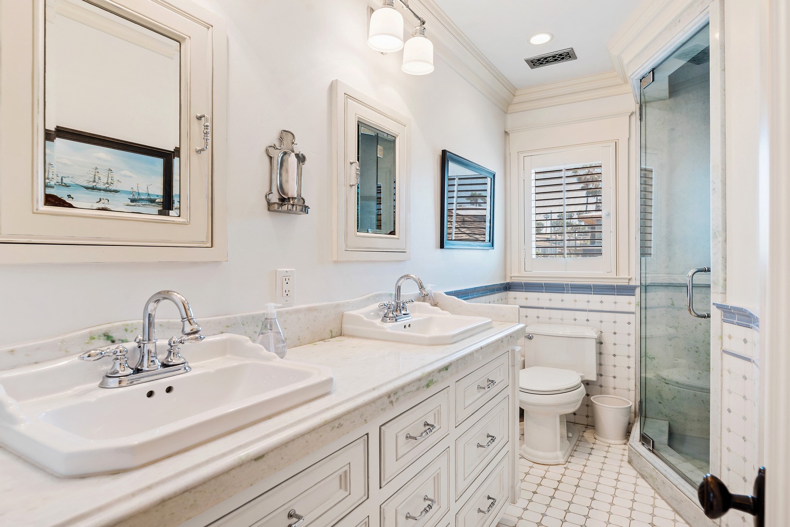 Hall bathroom with dual-sink vanity