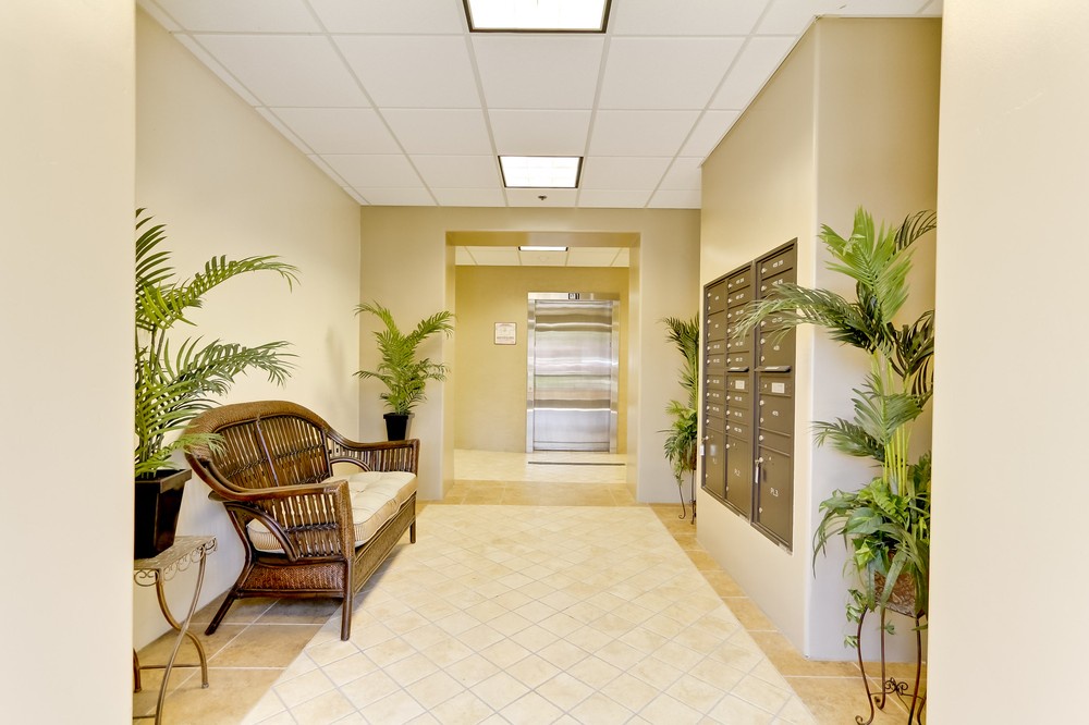 Foyer and elevator to second level