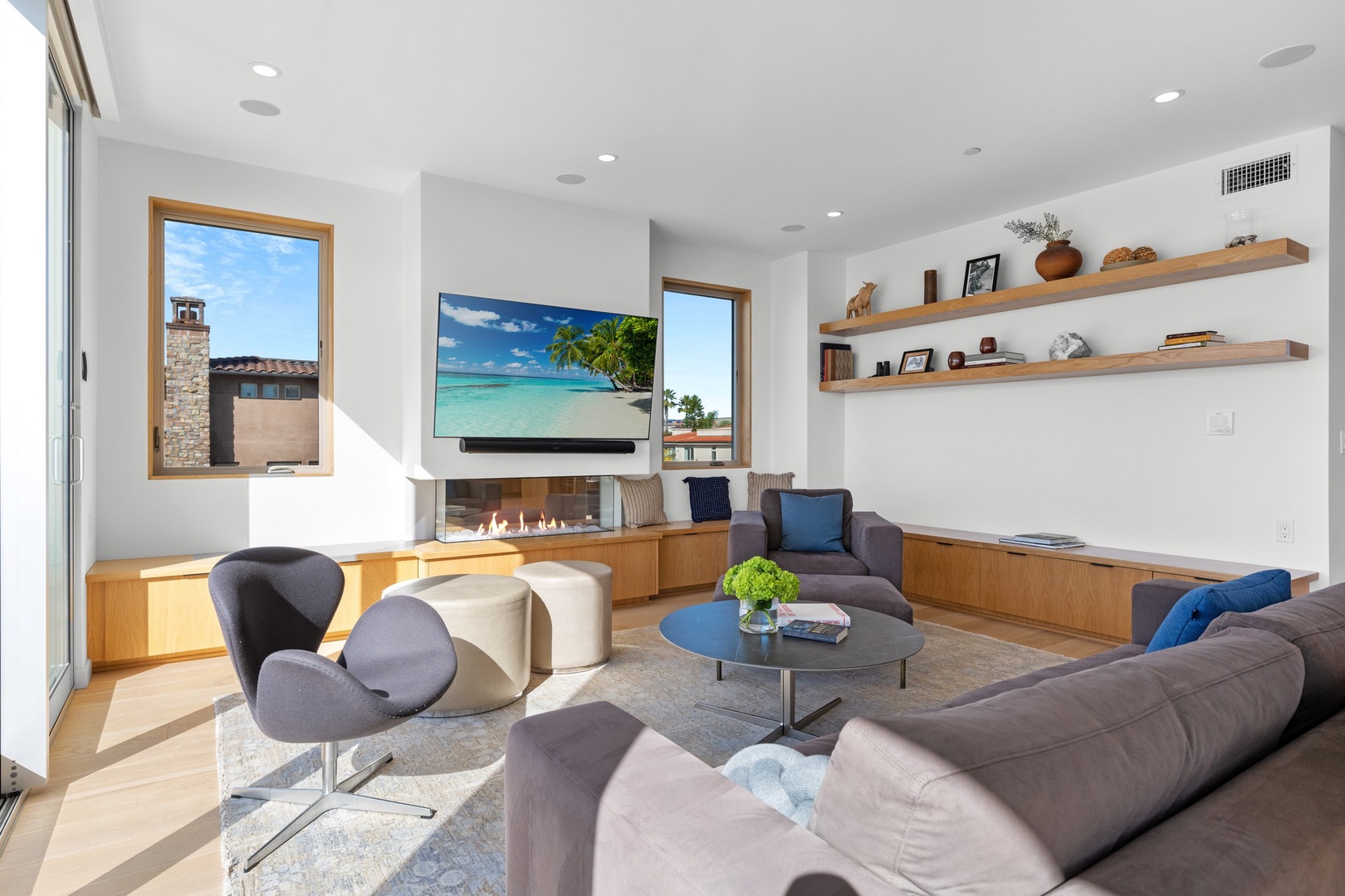 Living area with TV and fireplace