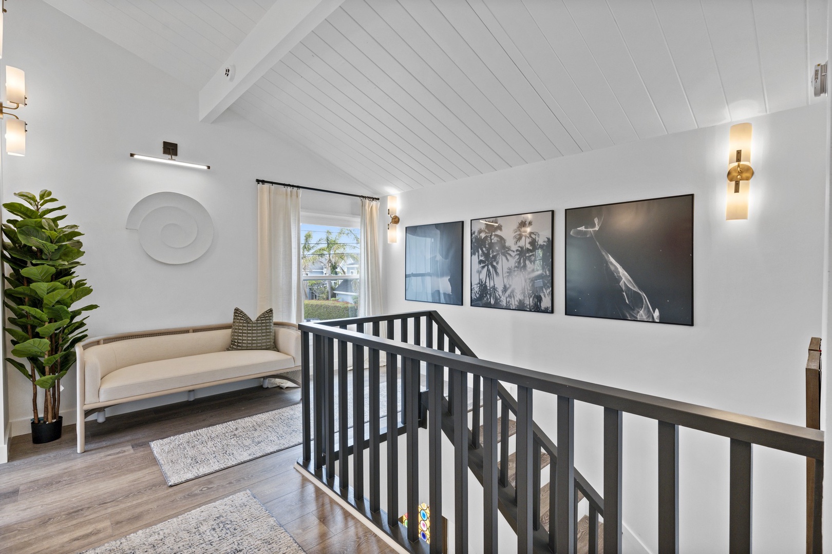 Stairs to upper level with railings