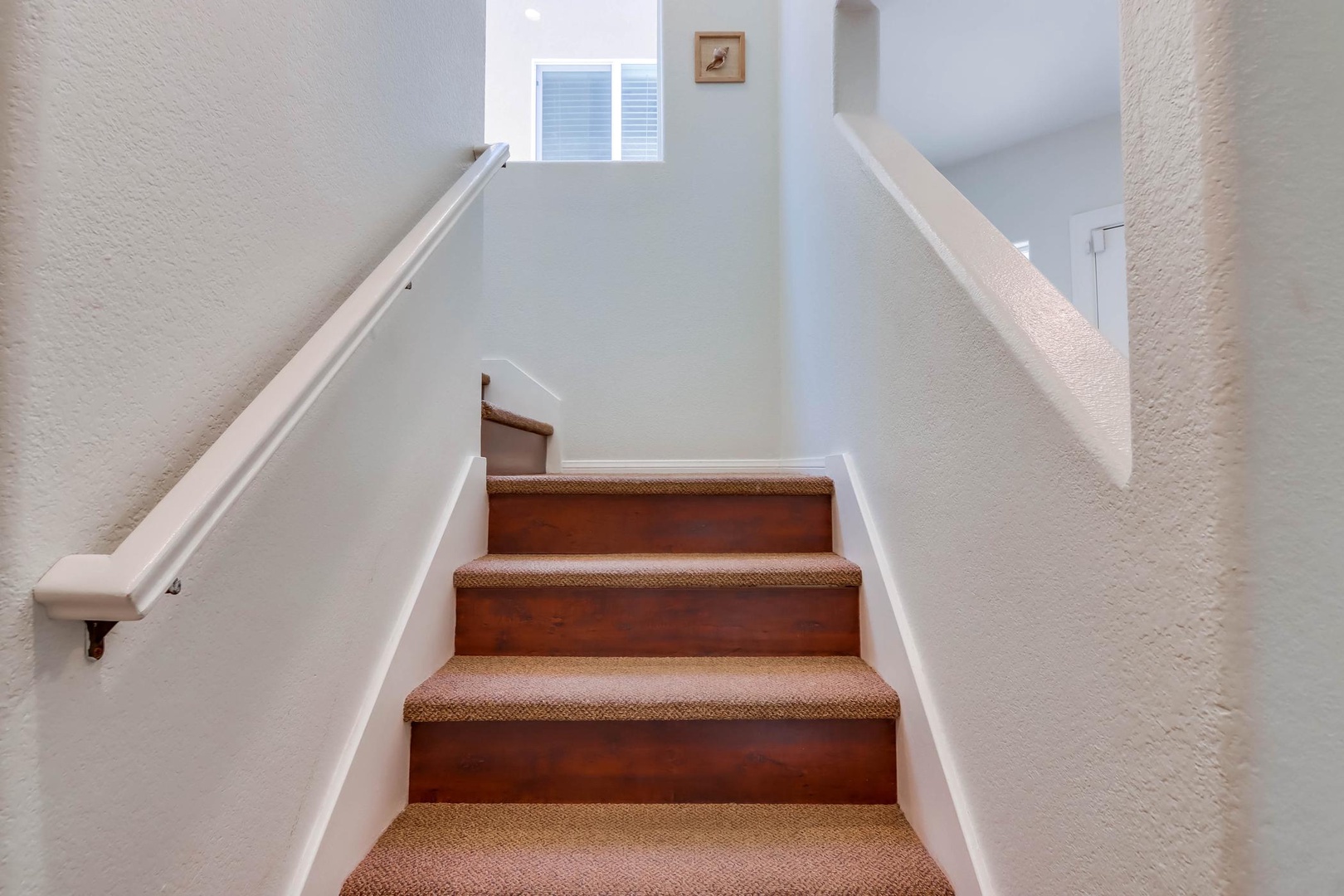 Staircase leading to main level