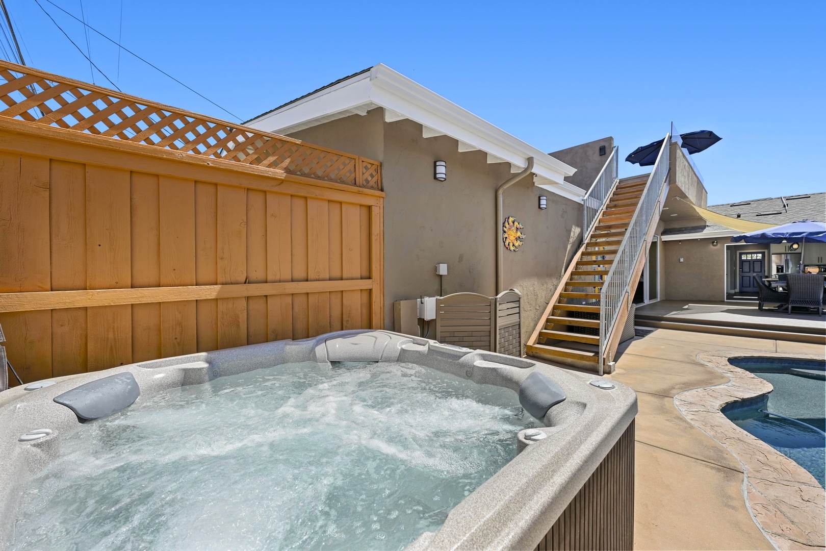 Bubbling hot tub on the pool deck