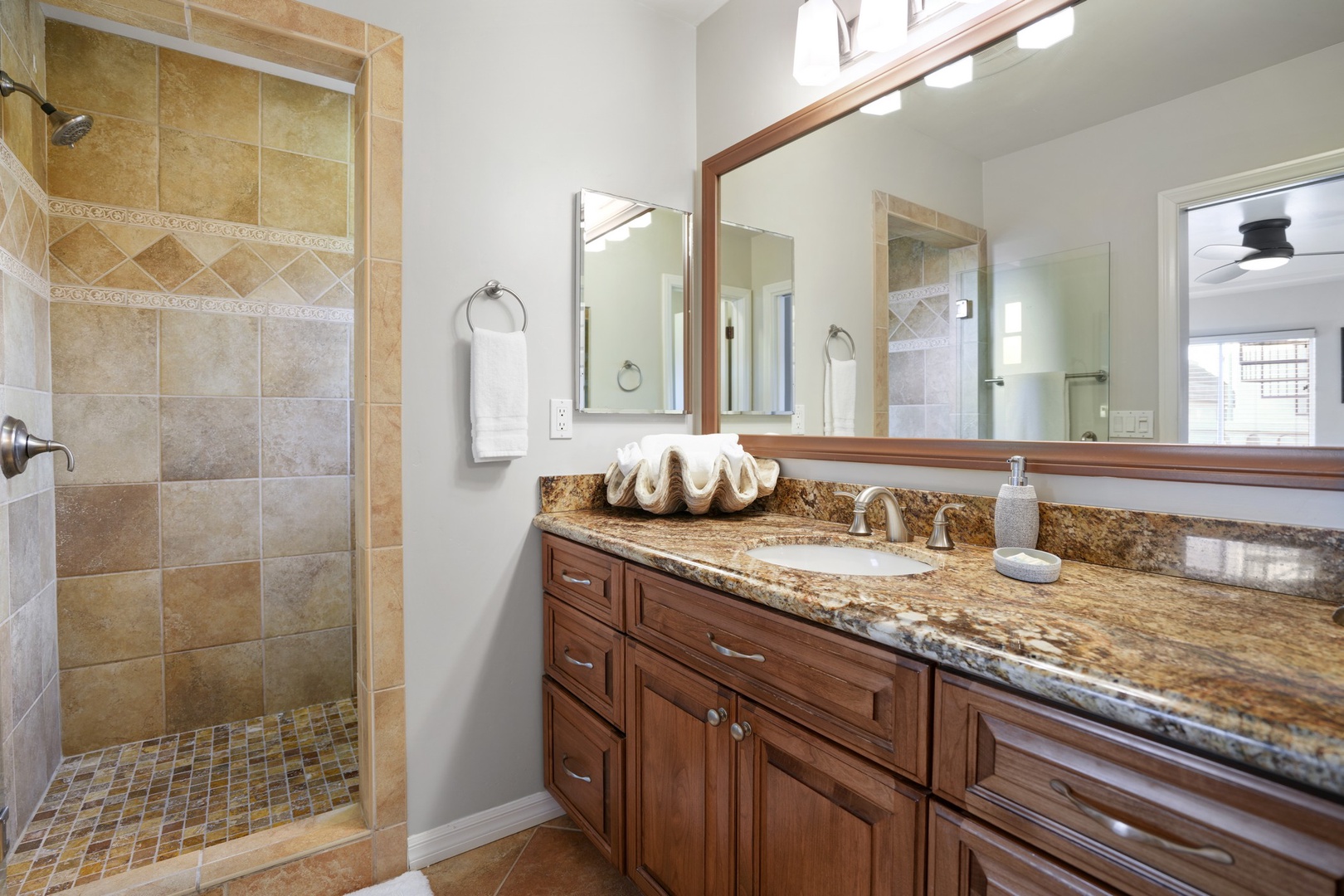 En-suite bath with shower