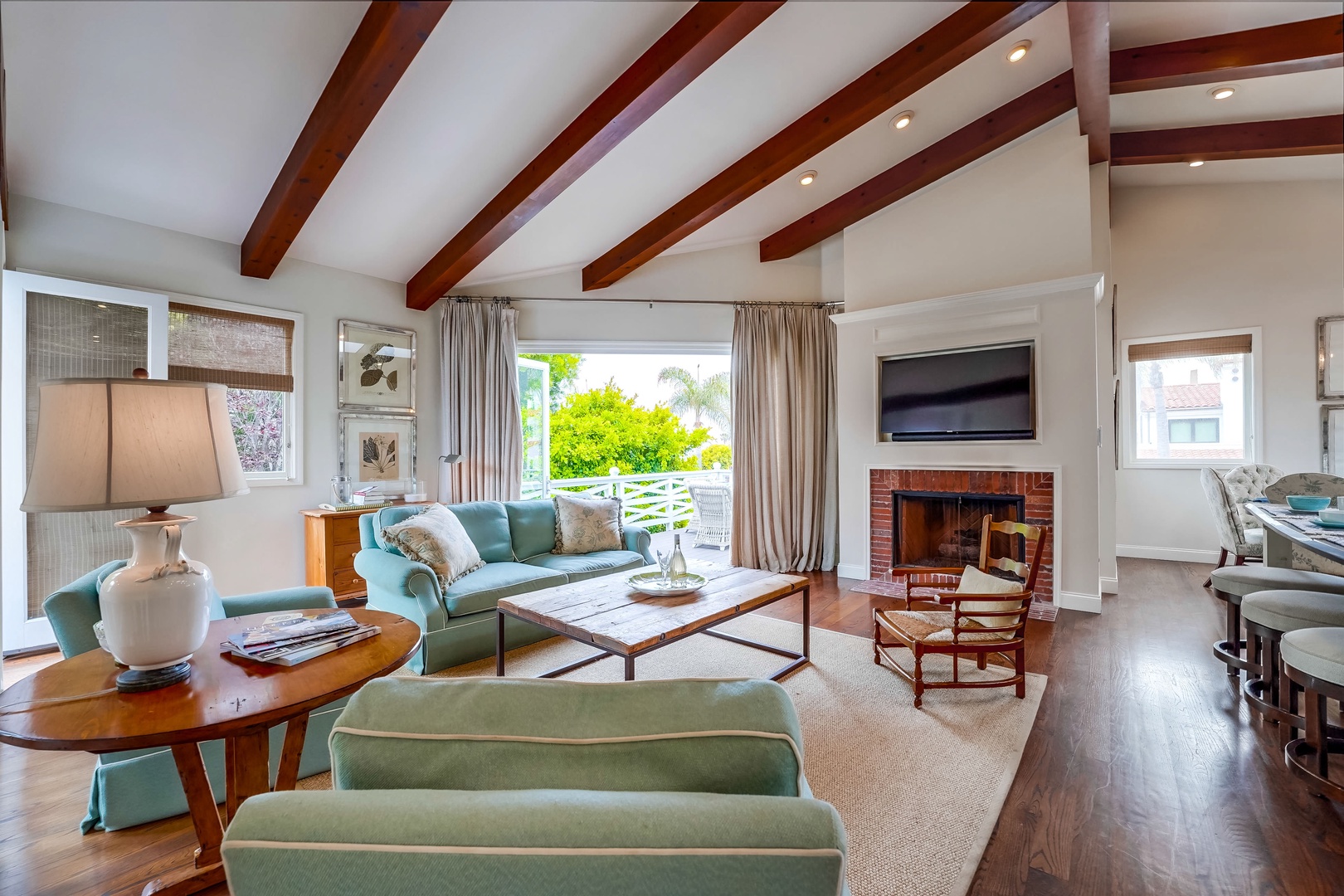 Living area with fireplace and TV