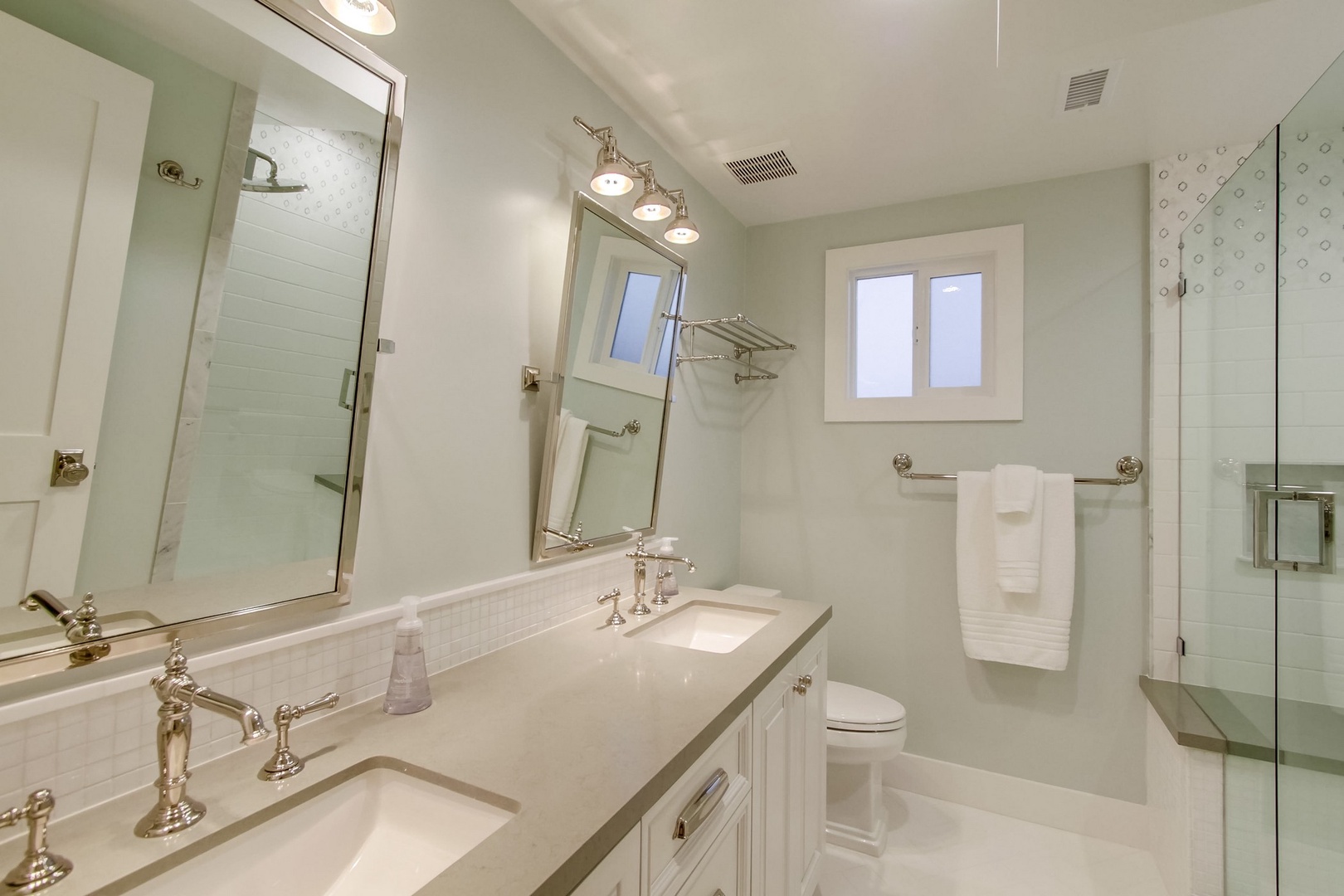 Dual sink vanity and shower