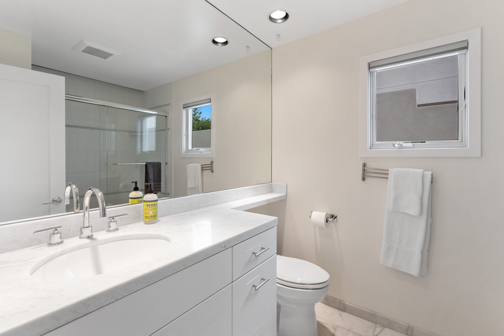 Guest house bathroom with a tub/shower