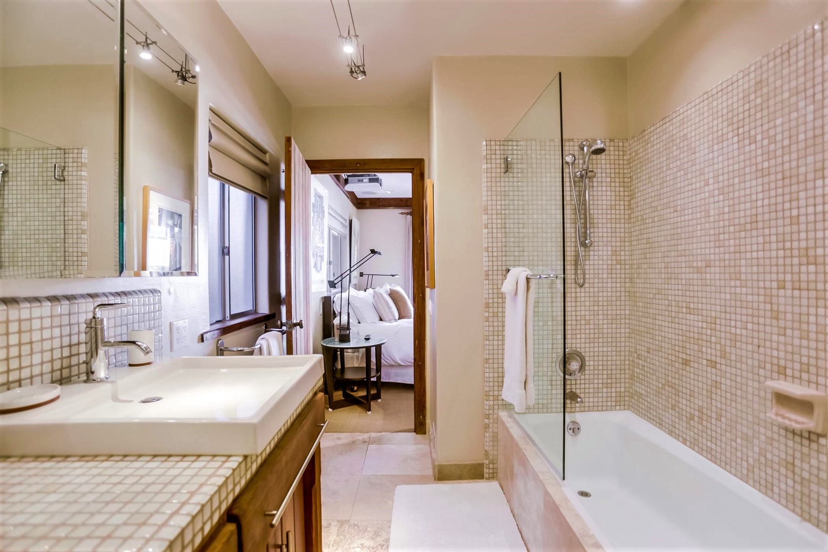 En suite bathroom with tub & shower