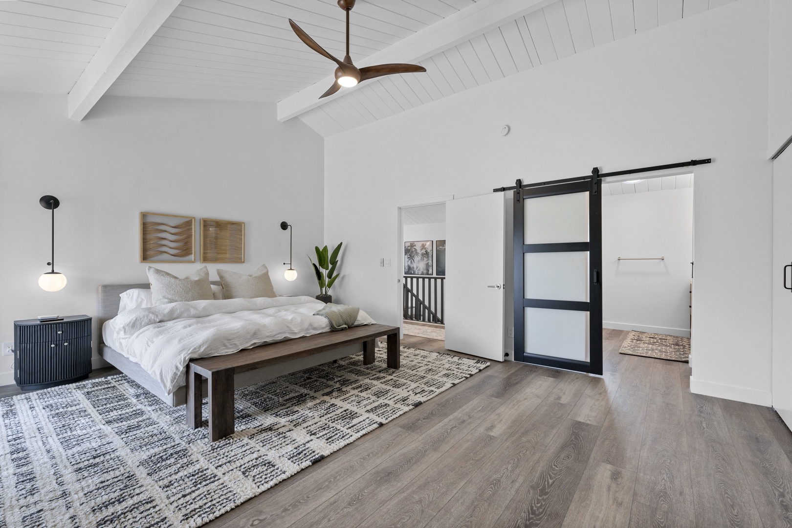 Primary Suite: King Bed, ensuite bath, flat panel TV & views