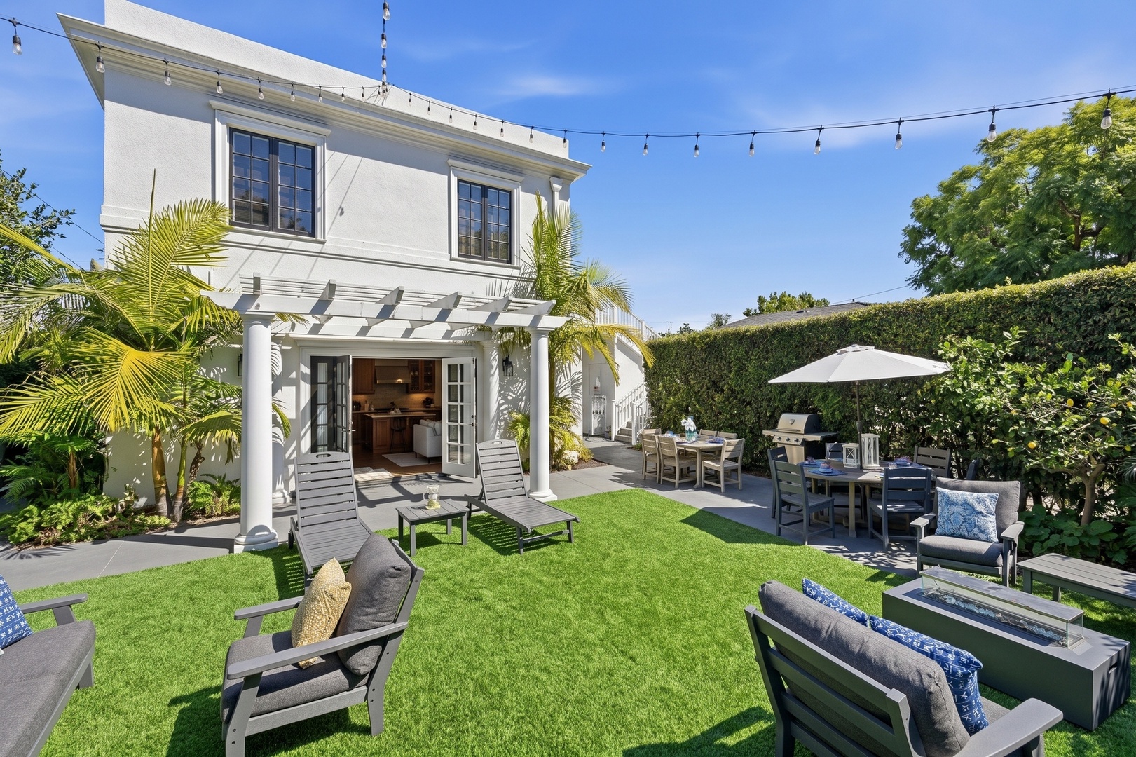 Shared yard with dedicated seating and dining