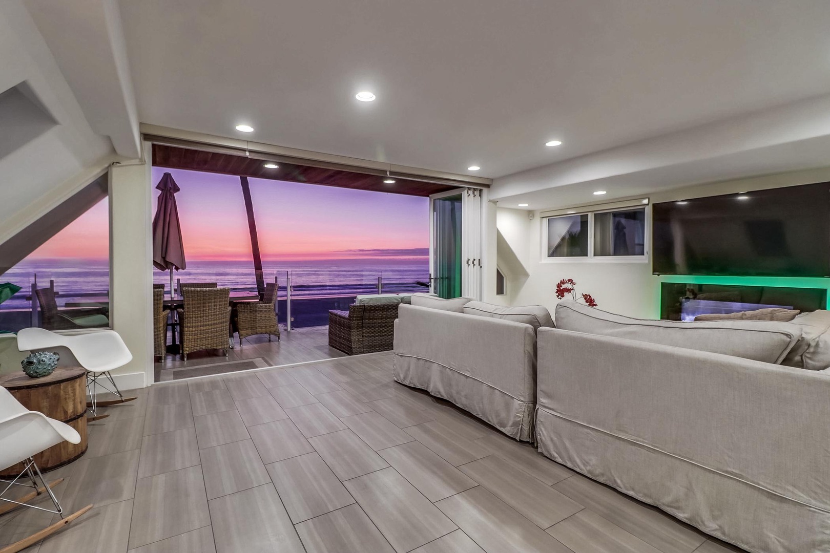 Living room opens to the ocean