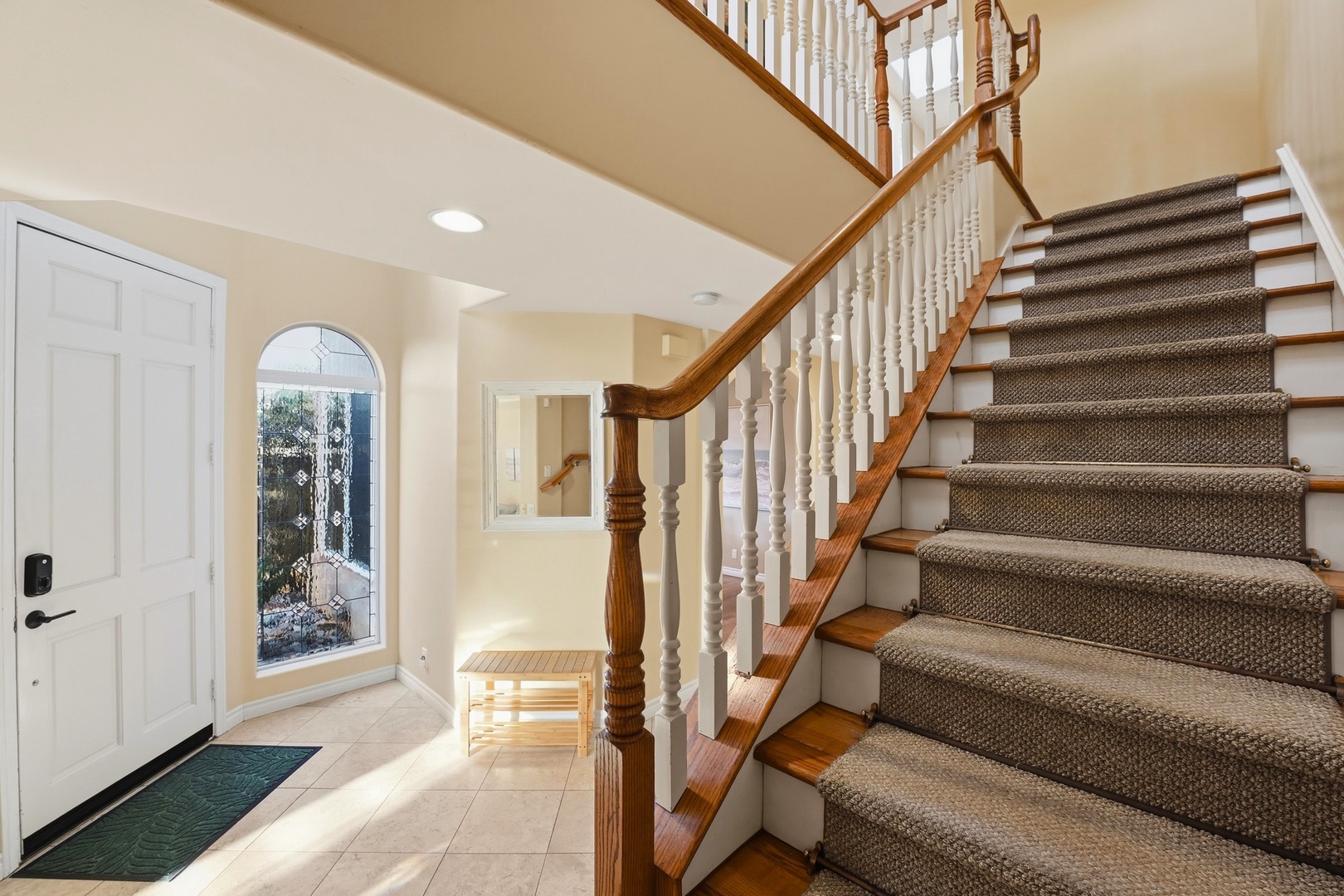 Entry Foyer and Stairs to Guest Bedrooms