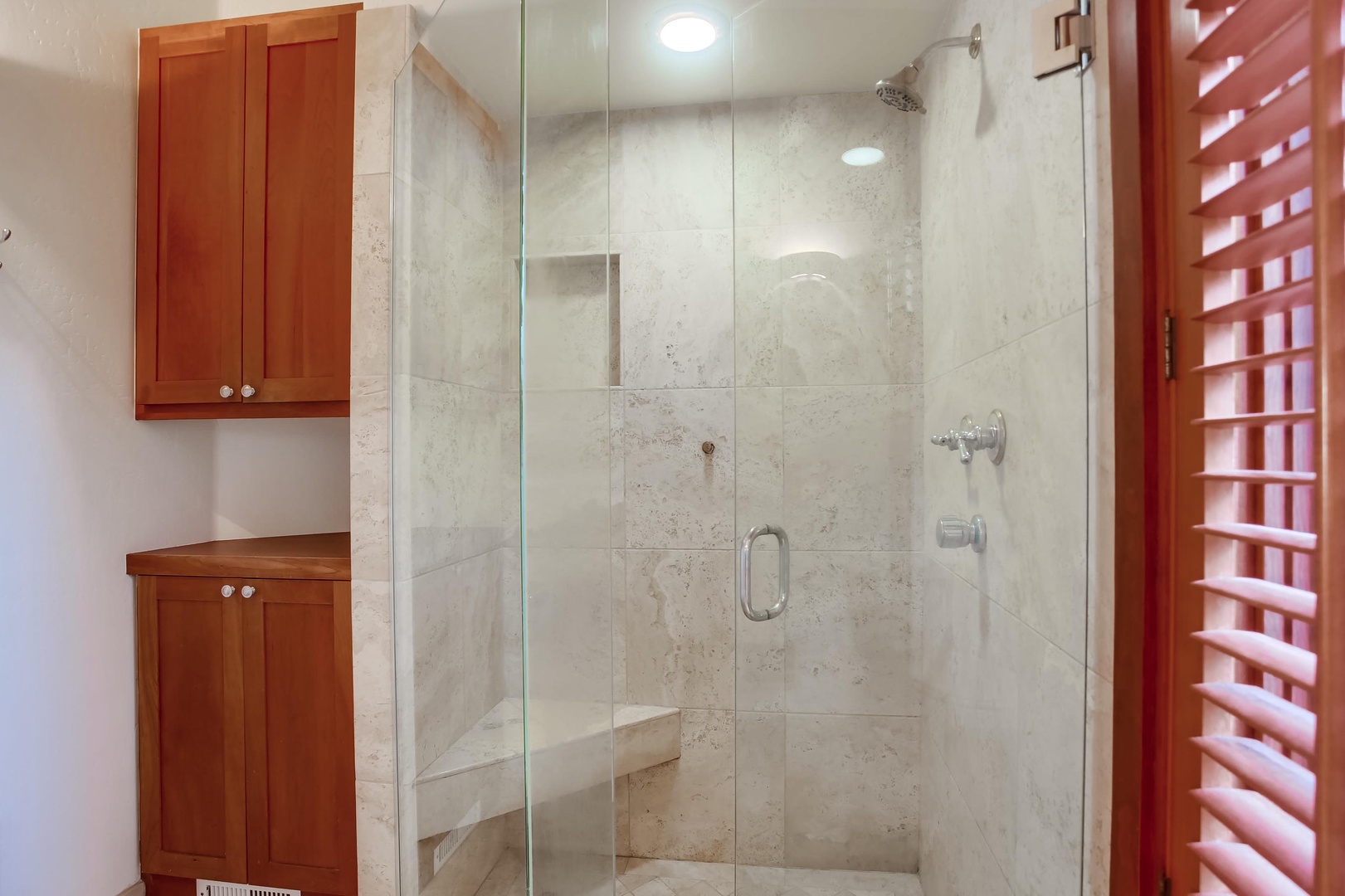 Glass and stone enclosed shower