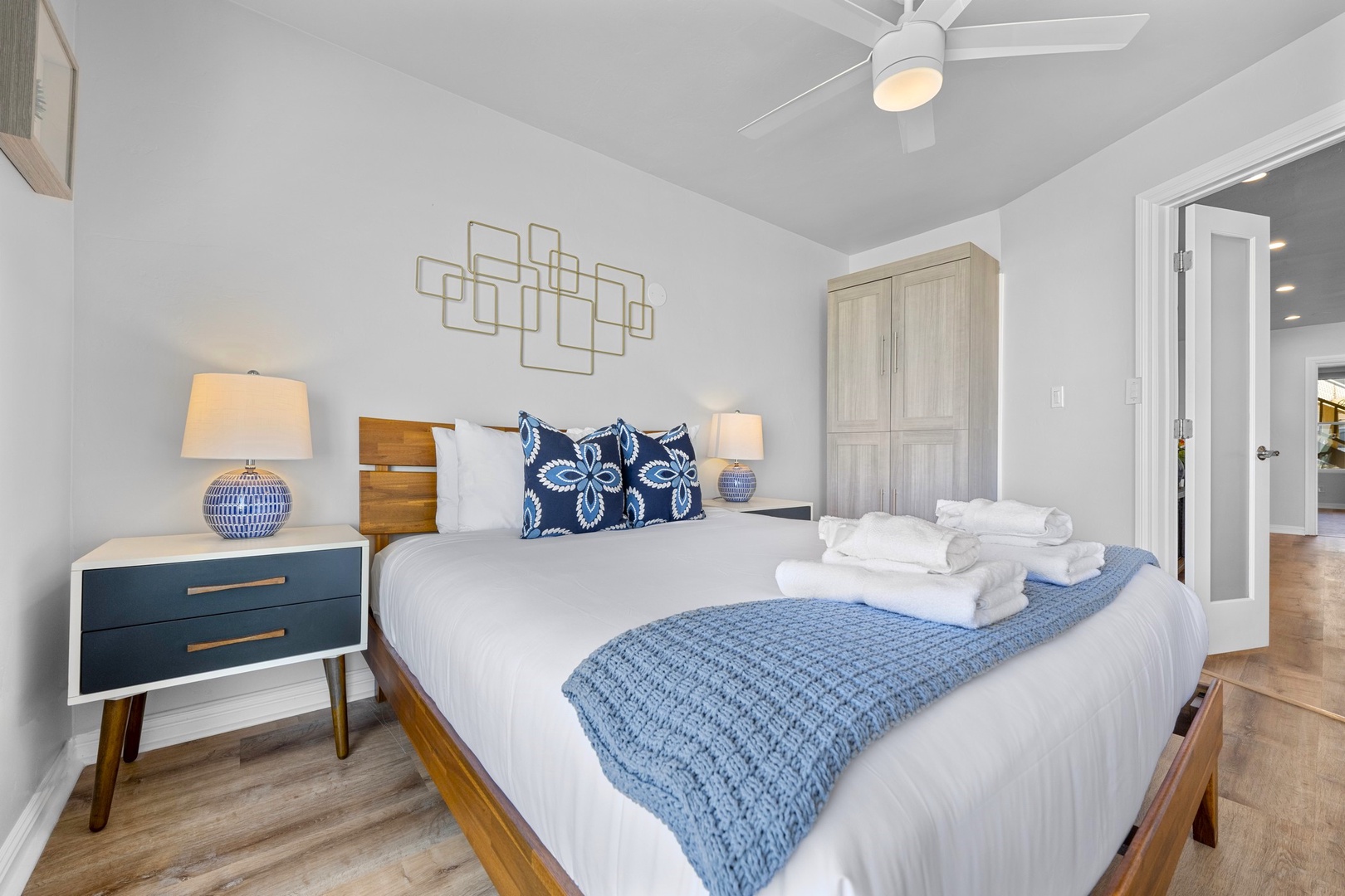 Guest bedroom 1 with a ceiling fan