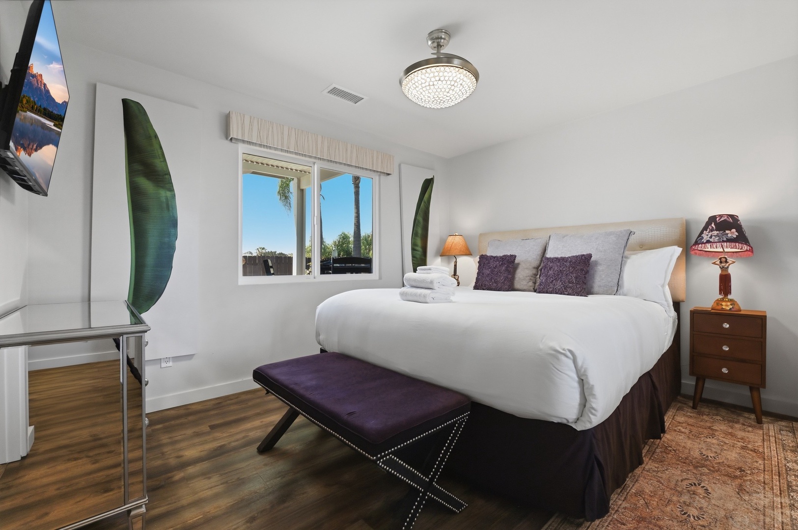 Sink into crisp white linens and let natural light from your private window illuminate your peaceful retreat space.