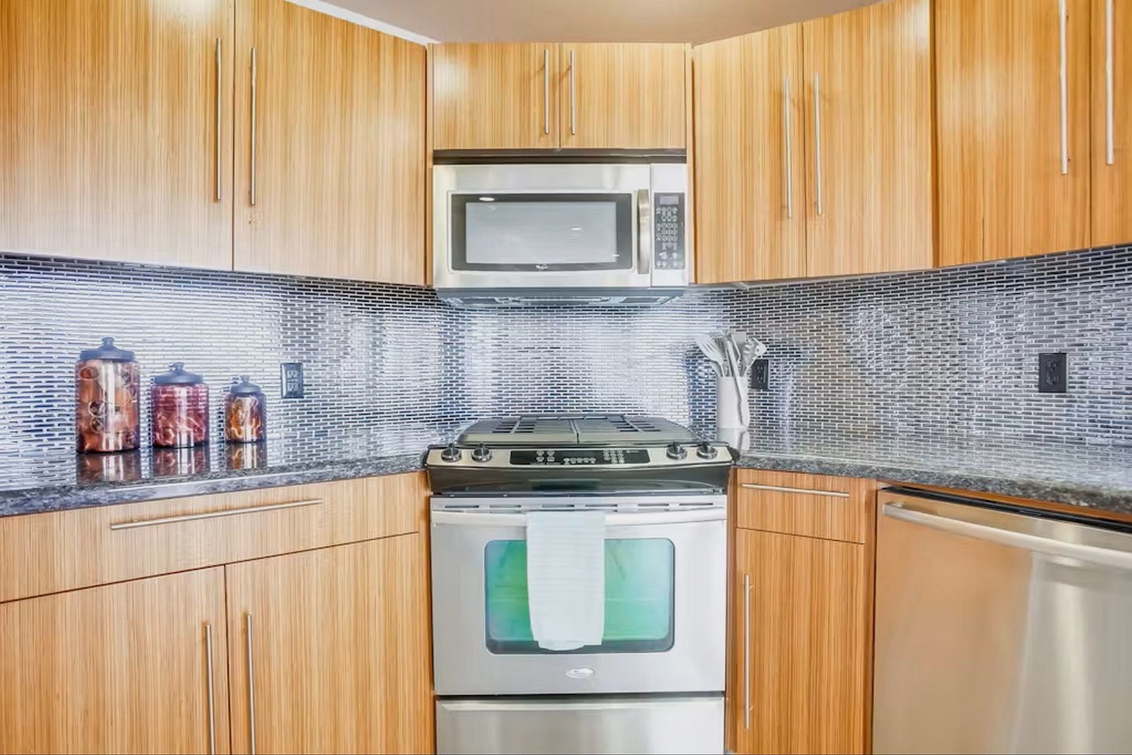Sleek kitchen with tile backsplash