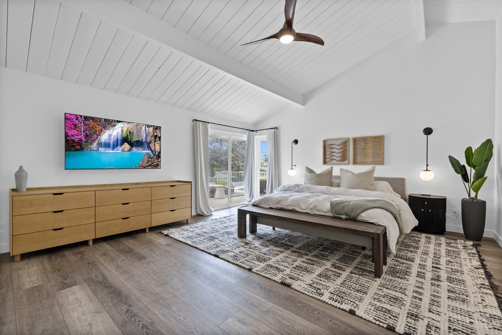 Primary Suite: King Bed, ensuite bath, flat panel TV & views