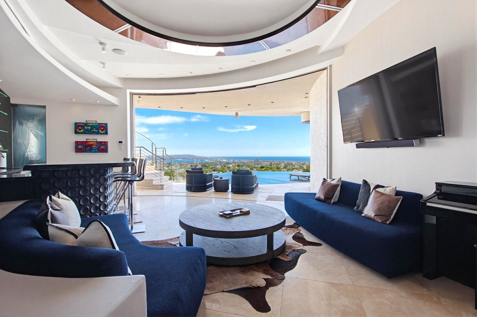 Lounge level with floor-to-ceiling glass doors