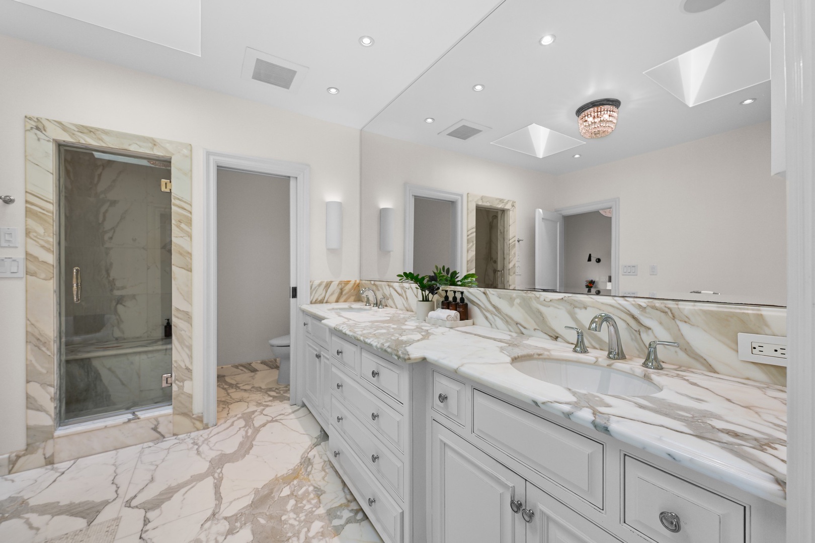 Primary suite bath with tub and shower