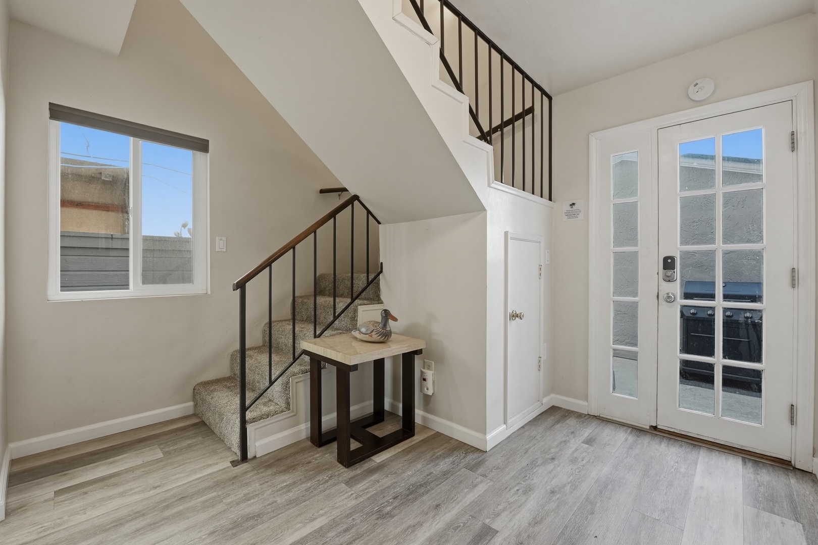 Staircase and rear patio access