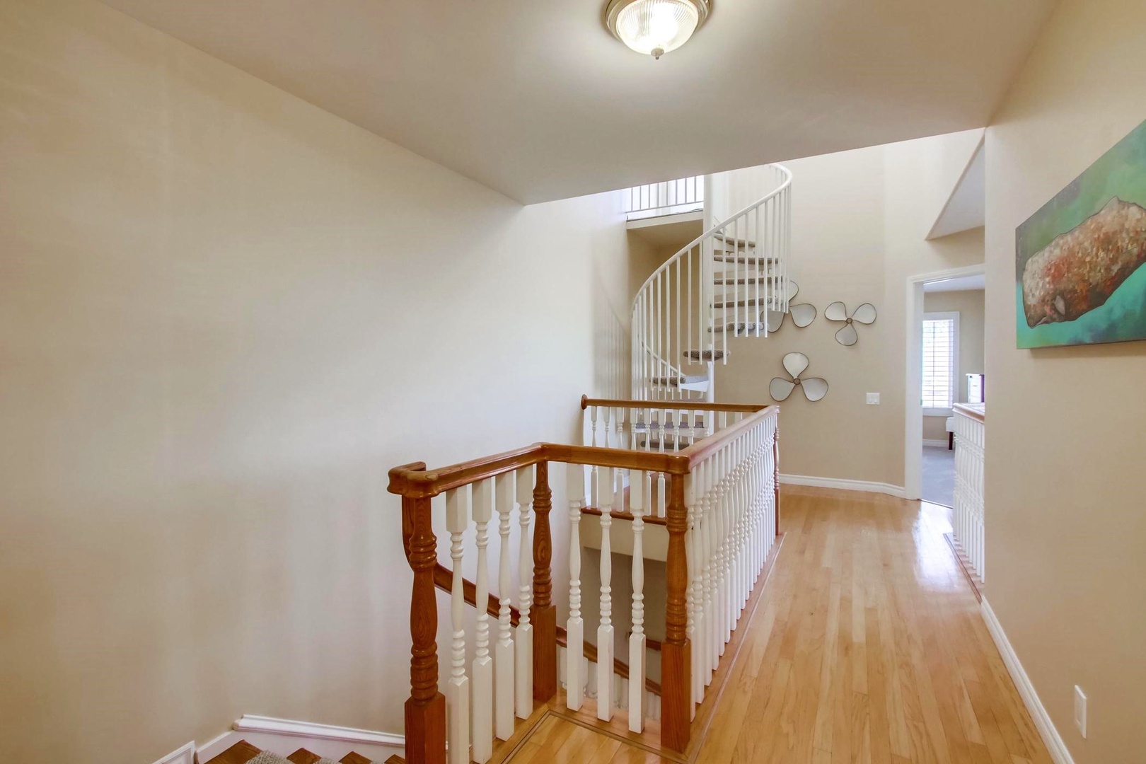 Spiral staircase to roof-top deck