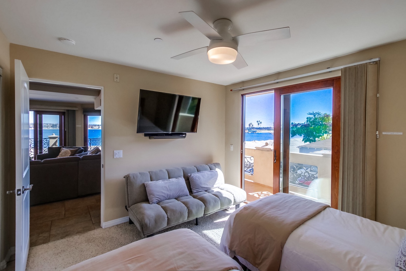 Bedroom 3 with futon and balcony