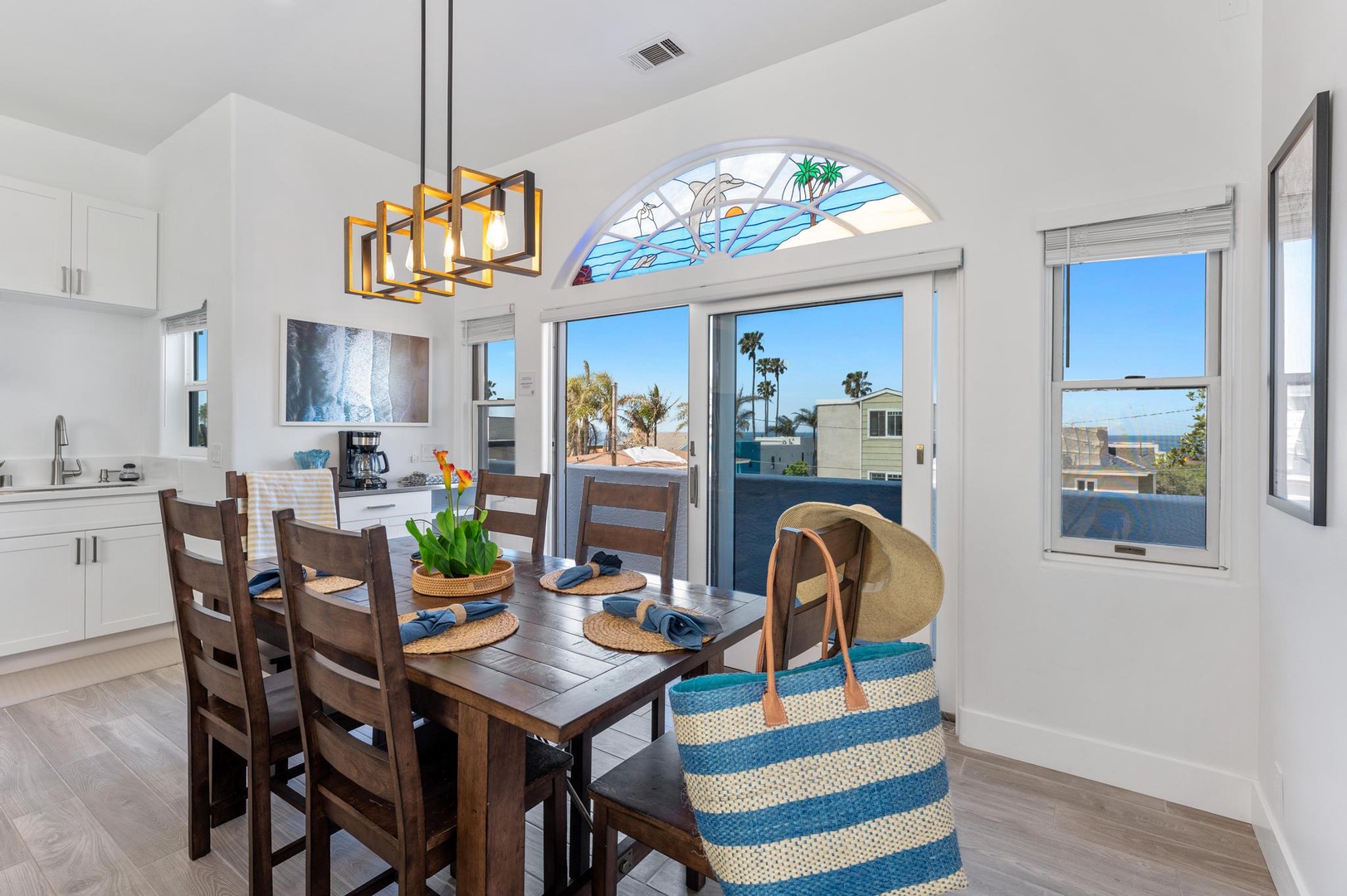 Dining area leads to upper balcony