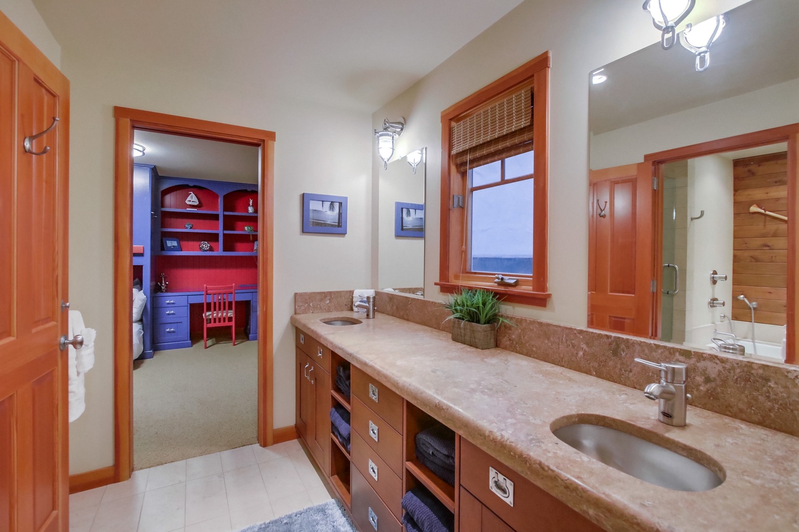 Features a dual sink vanity