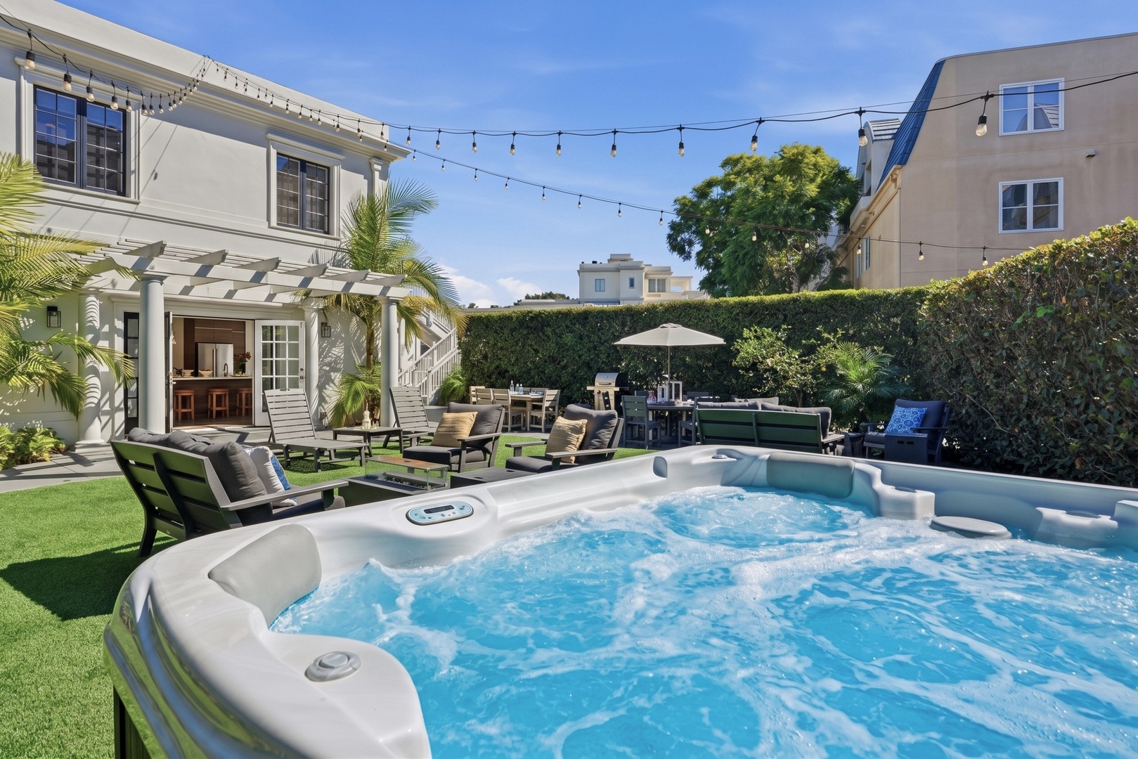 Luxurious backyard oasis with a hot tub