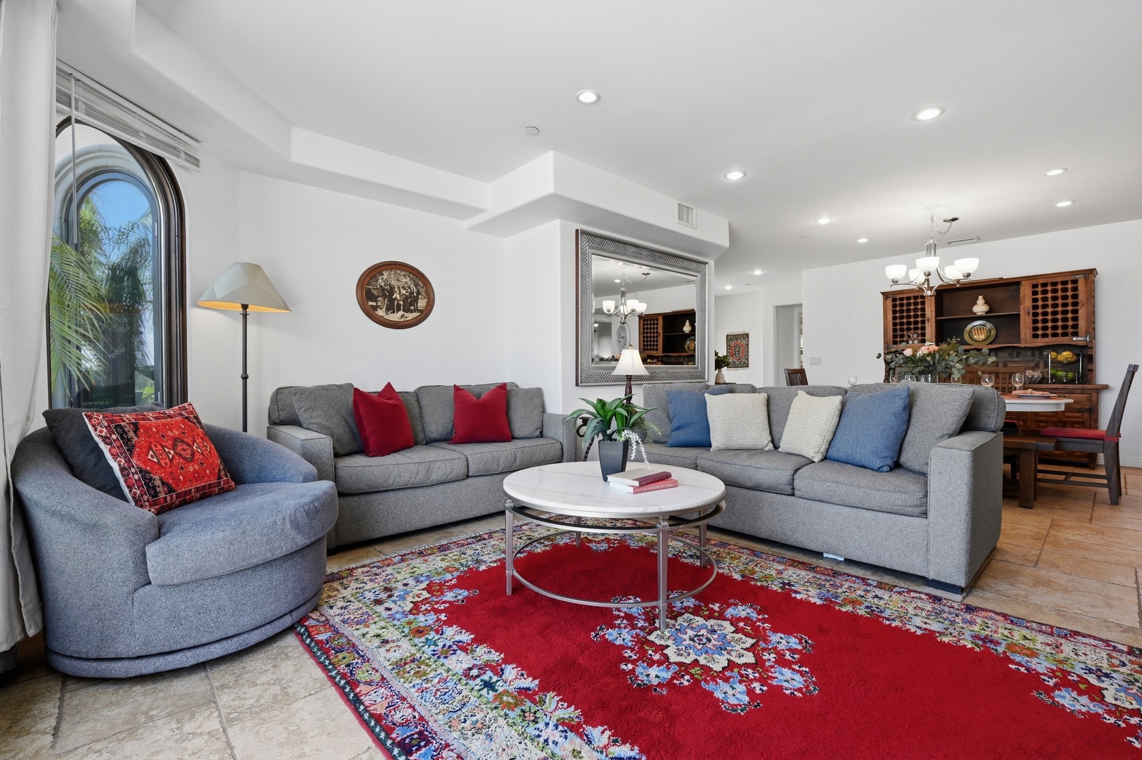 Sink into plush sectional seating where you'll unwind with vibrant colors and elegant touches creating your perfect retreat.