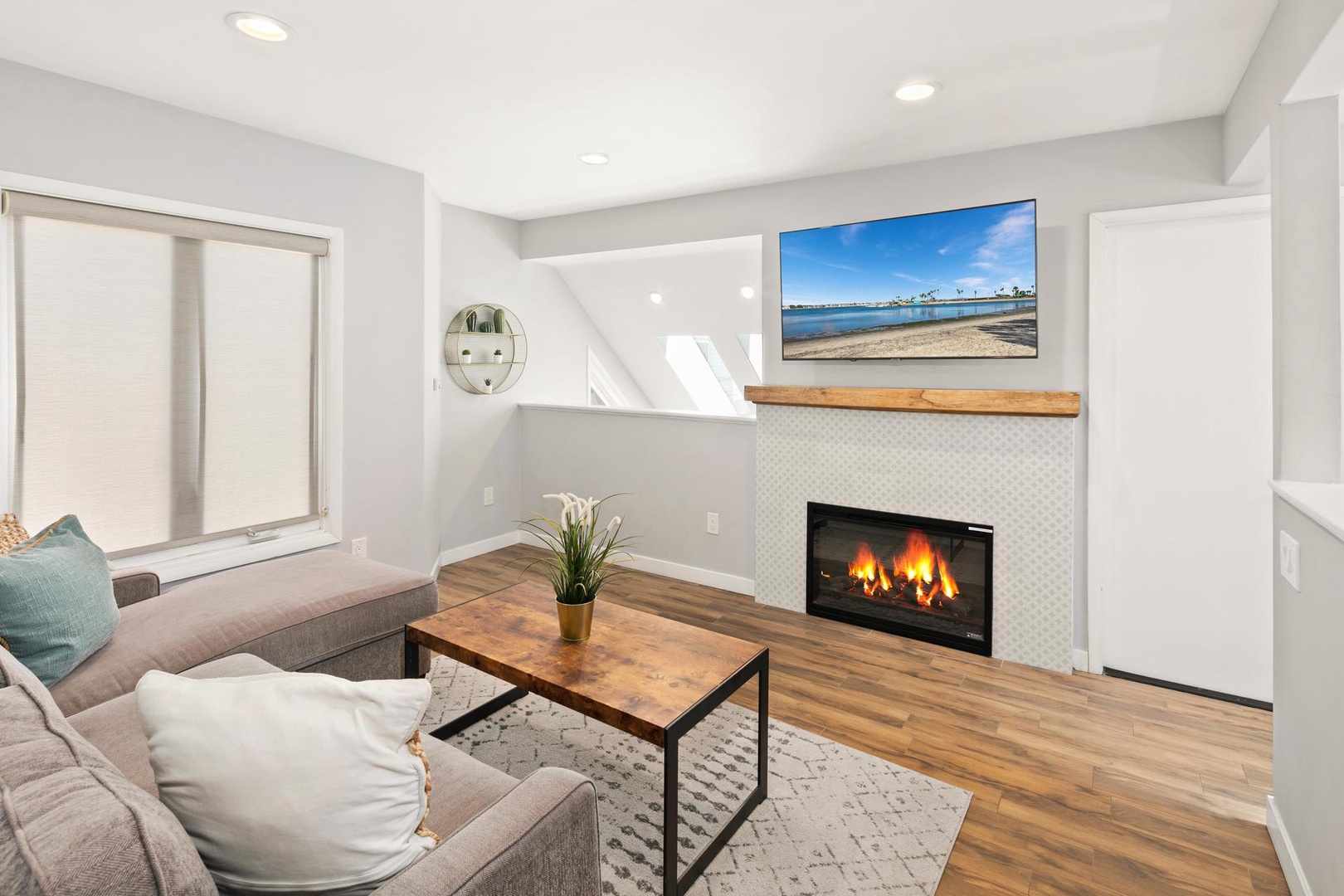 Loft with fireplace and TV