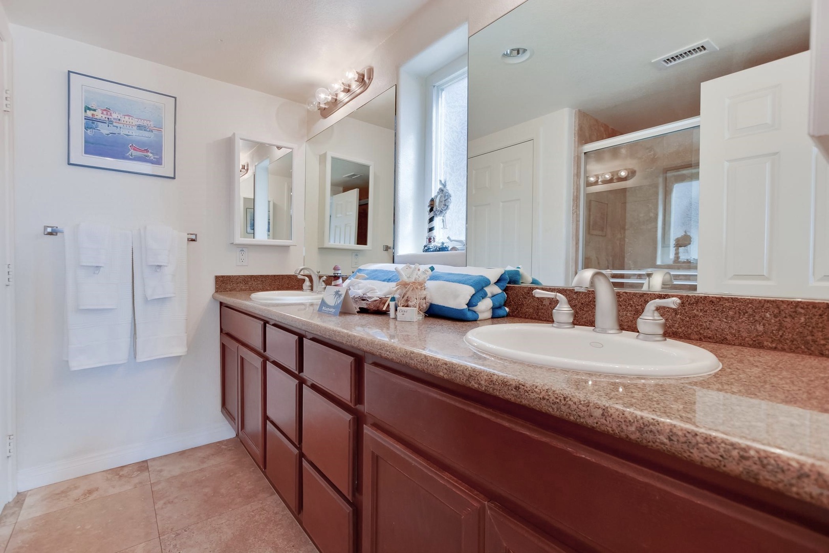 Dual-sink vanity in primary bathroom