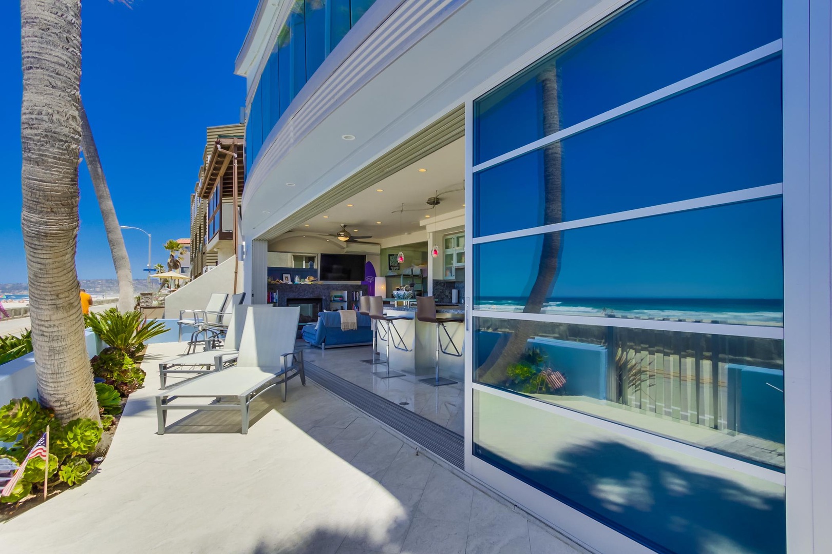 Beachfront patio for people watching