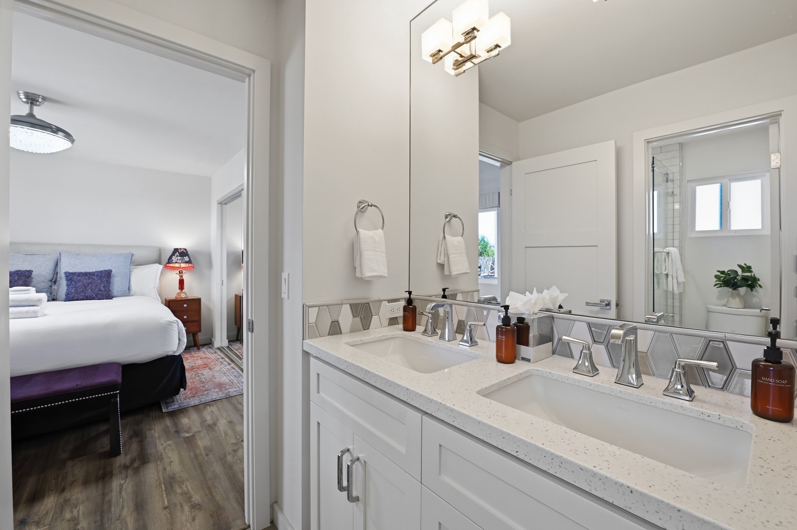Freshen up in your stylish en-suite with dual vanities and premium amenities, just steps from your cozy bedroom.