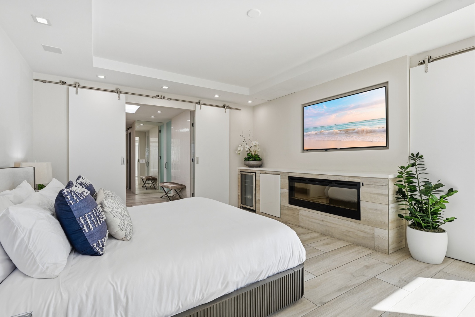 Linear fireplace, mini fridge and TV