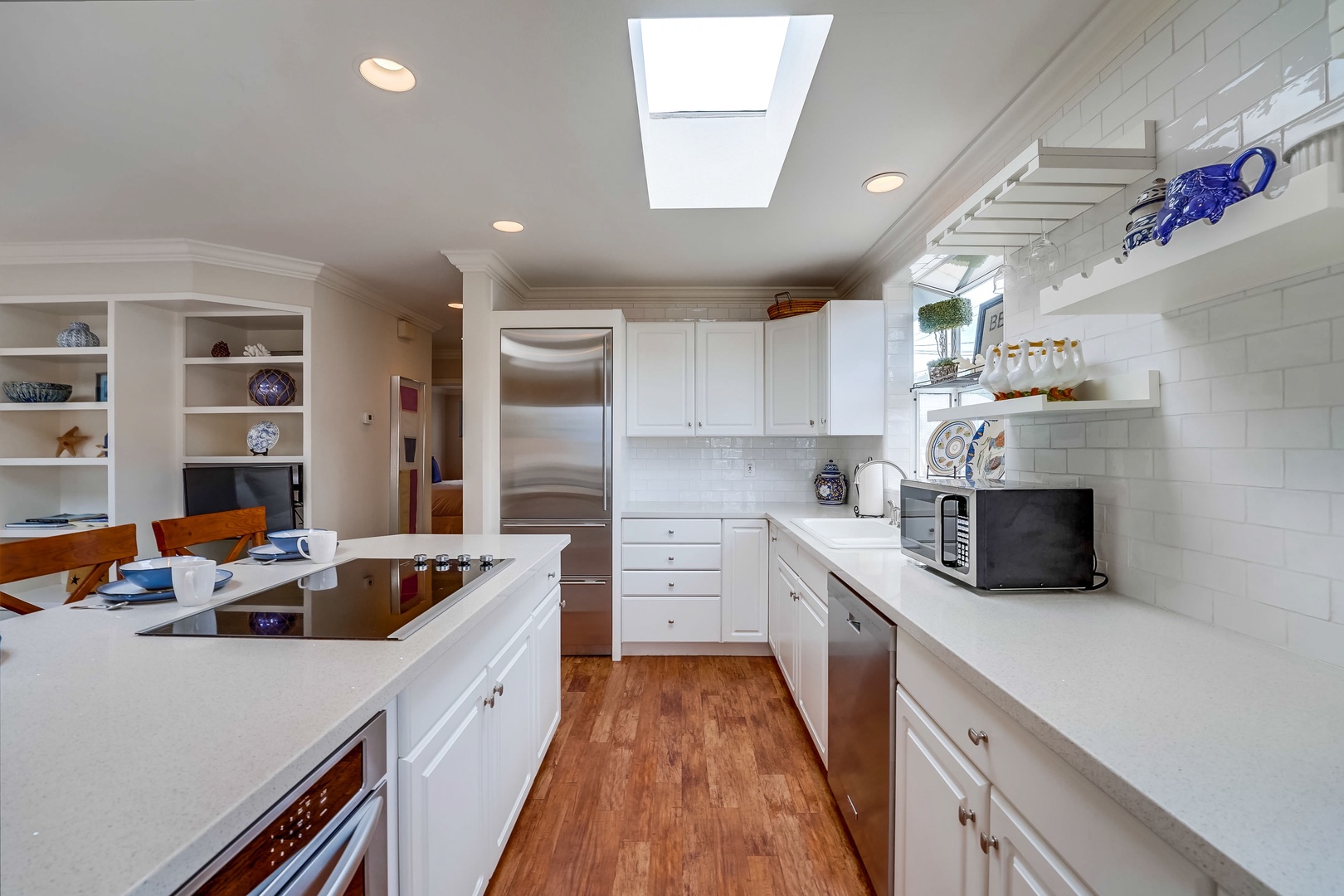 Clean white tile and stone counters