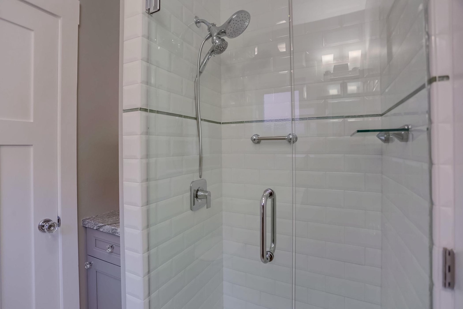 Glass-enclosed shower