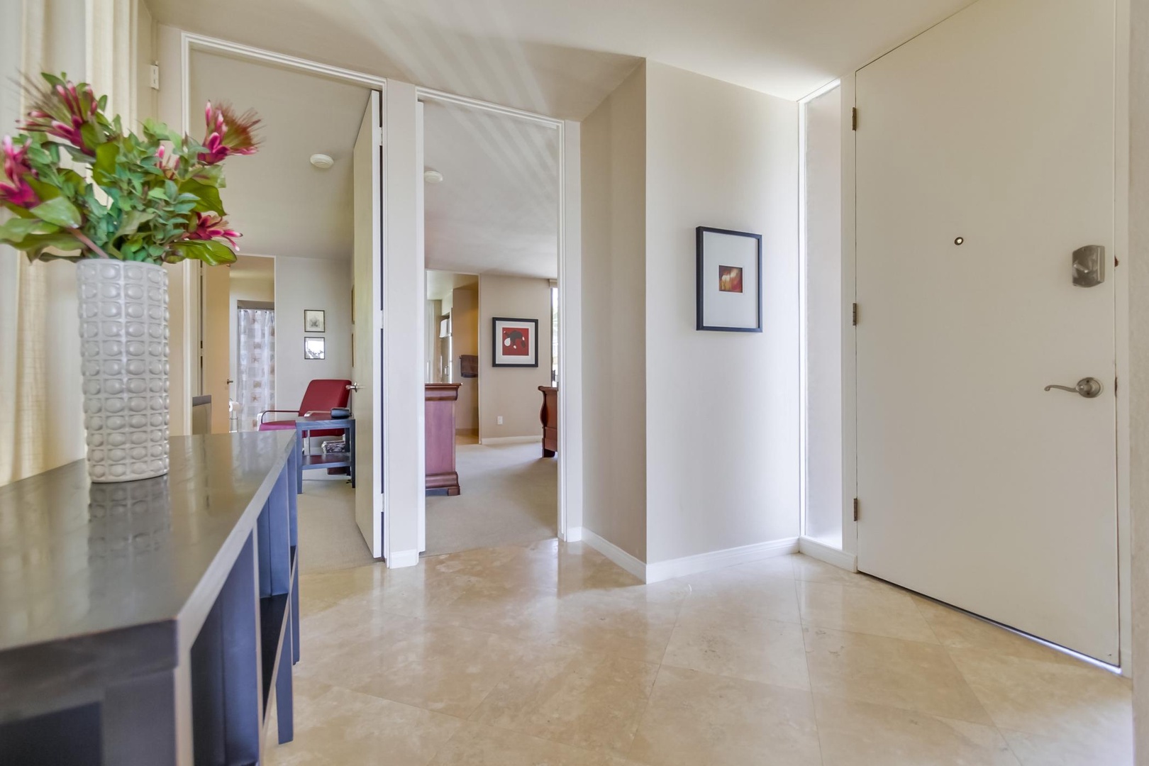 Foyer opening up to living area