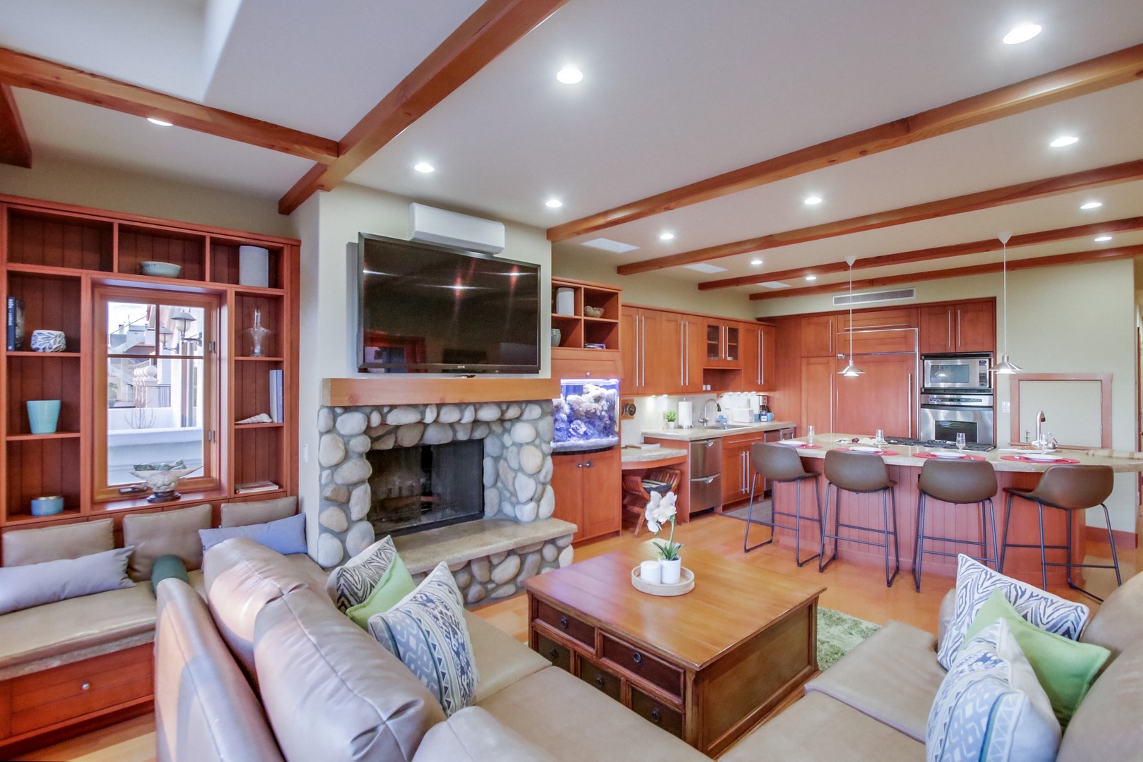 Open floorplan and wood-beamed ceilings