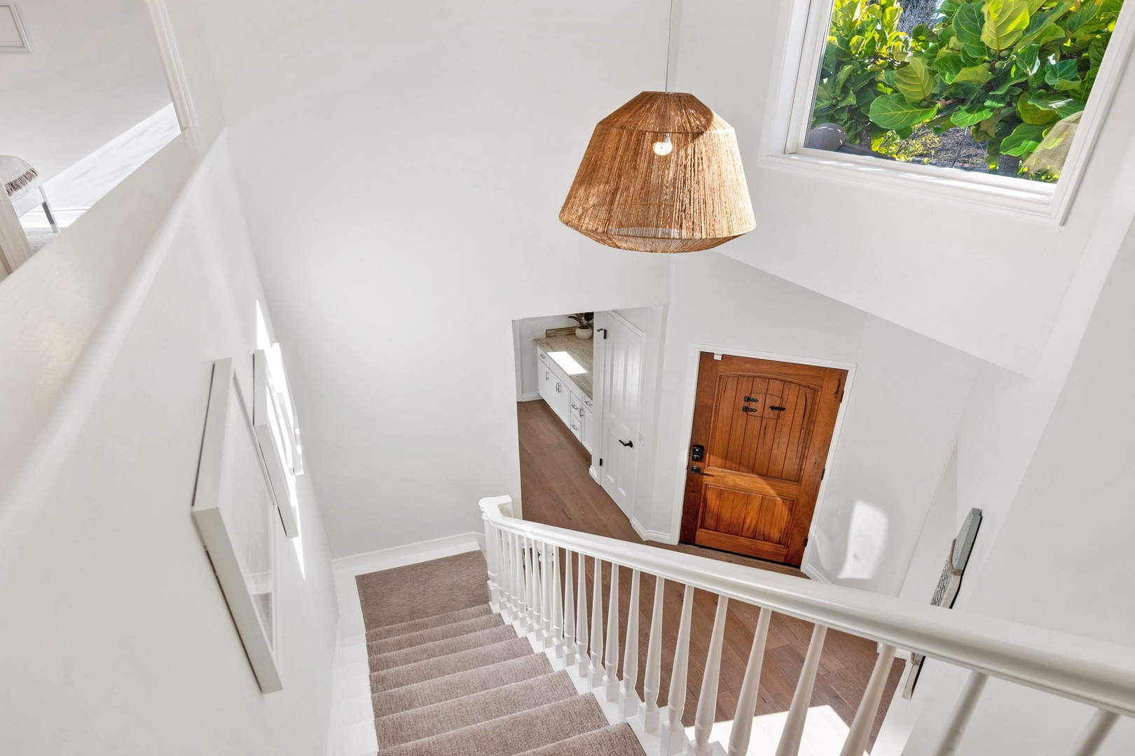 Stairs up to 3 of the 4 bedrooms