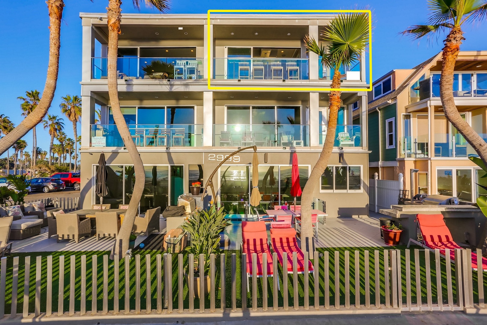 Beach level yard with dining and lounges