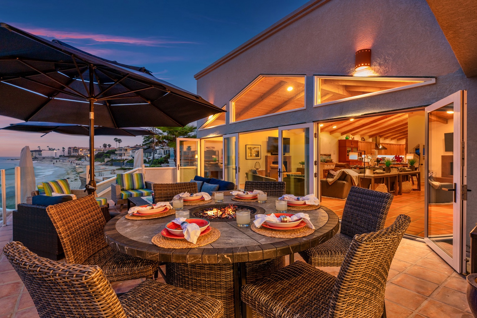 Oceanfront dining with a fire table