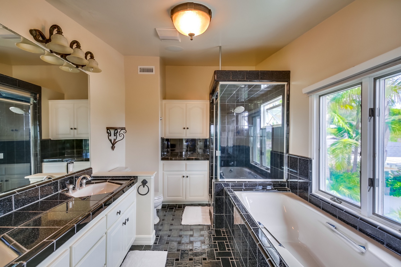 En suite bathroom with tub & shower