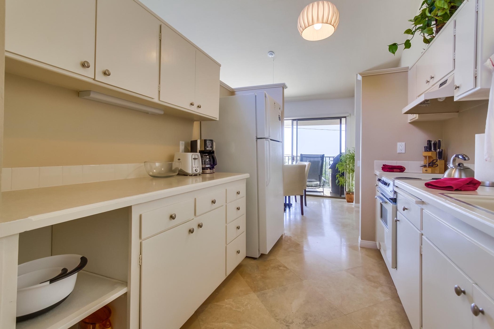 Kitchen leads to dining area