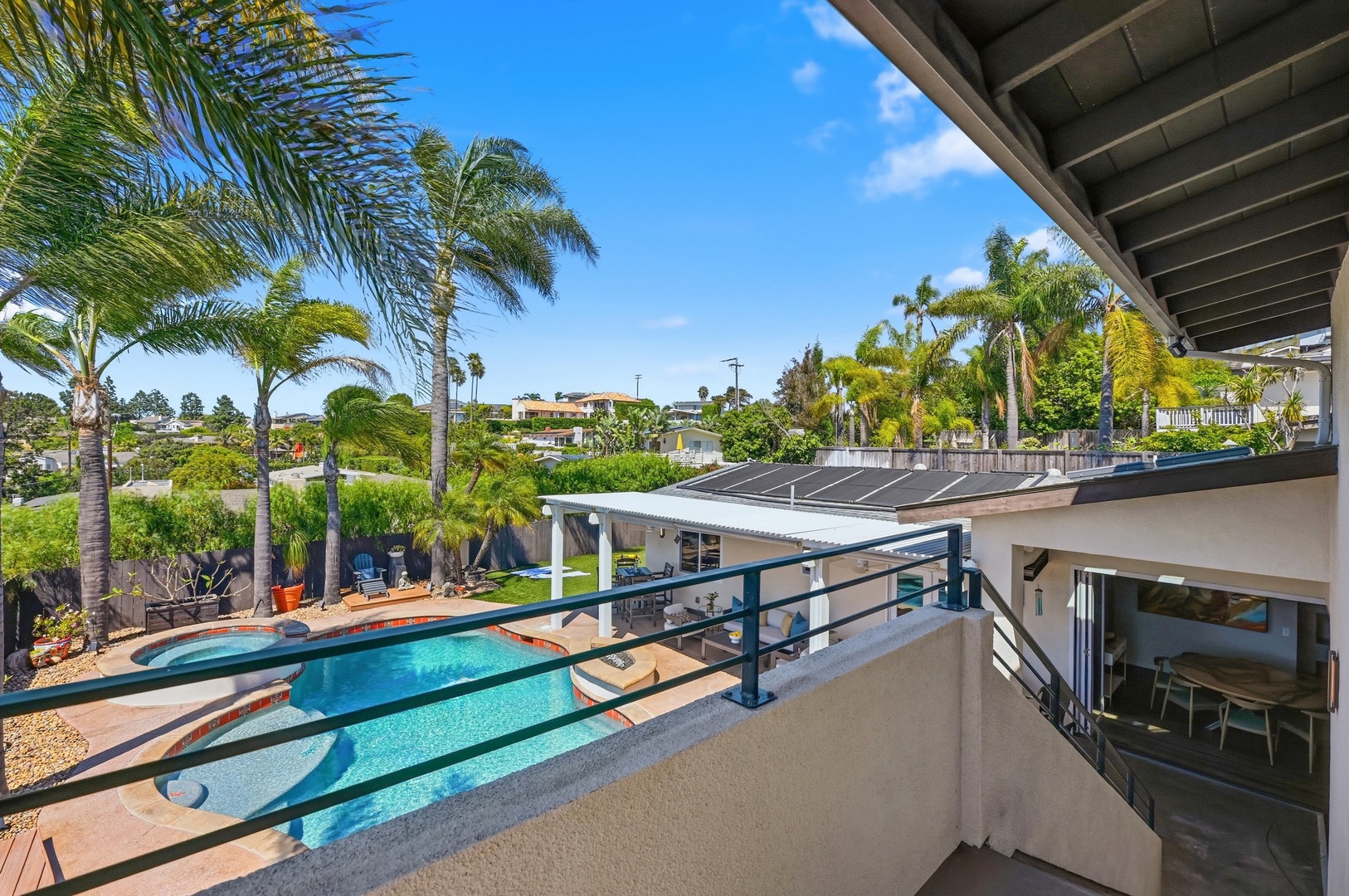 Step onto your private balcony and soak in stunning pool views framed by swaying palms under endless blue skies.